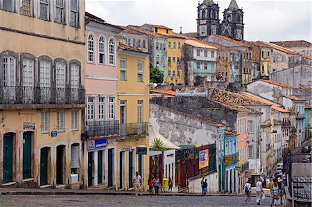 salvador - Brazil,Bahia,Salvador. The city of Salvador - within the historic old city,a UNESCO World Heritage listed location,a cobbled street lined with colonial style houses links the Cidade Alto,higher town with the Cidade Baixa the lower town. Stock Photo - Rights-Managed, Code: 862-03289749