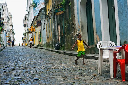 salvador - Brazil,Bahia,Salvador. The city of Salvador within the historic Old City,a UNESCO World Heritage listed location. Street scene that reflects the cultural richness of the city and its well preserved colonial architecture. Foto de stock - Con derechos protegidos, Código: 862-03289756