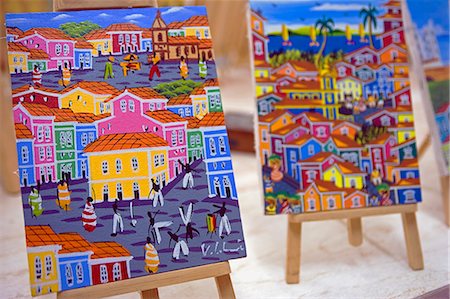 salvador - Brazil,Bahia,Salvador. The city of Salvador within the historic Old City,a UNESCO World Heritage listed location. Local art reflects the strong African influence with vibrant colours and traditional cultural scenes. Stock Photo - Rights-Managed, Code: 862-03289753