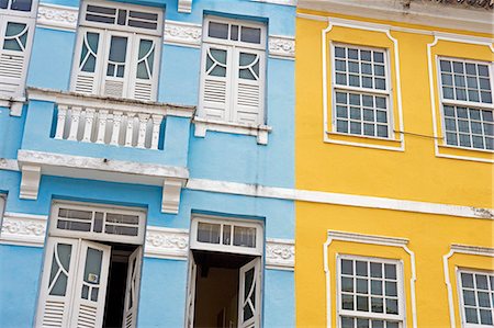 salvador - Brazil,Bahia,Salvador. Within the historic Old City,a UNESCO World Heritage site,near the Sao Francisco Church of Salvador detail of the renovated classic windows,shutters and facade of colonial style town houses. Stock Photo - Rights-Managed, Code: 862-03289764