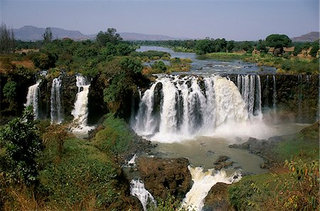 At 400m across and 45m deep,the Blue Nile Falls,known locally as Tis Abay or Smoking Nile,are at their most spectacular after the rainy season in October. Stock Photo - Rights-Managed, Code: 862-03354005