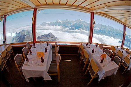 revolve - Switzerland,Bernese Oberland,Schilthorn. Revolving restaurant on the viewing gallery at Schilthorn. Stock Photo - Rights-Managed, Code: 862-03354735