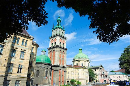 View of Old Town and the Virgin Marys Assumption Church Bell Tower. Lviv is a major city in western Ukraine. The historical city center is on the UNESCO World Heritage List and has many architectural wonders and treasures. Stock Photo - Rights-Managed, Code: 862-03355444