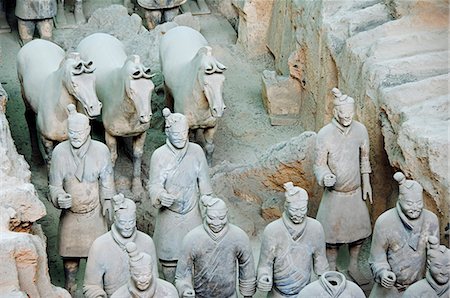 Mausoleum of the first Qin Emperor housed in The Museum of the Terracotta Warriors Pit 1. Opened in 1979 near Xian City,Shaanxi Province,China Stock Photo - Rights-Managed, Code: 862-03351052