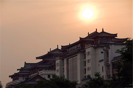 shaanxi province - Sunset over a chinese style hotel building,Xian City,Shaanxi Province,China Stock Photo - Rights-Managed, Code: 862-03351094