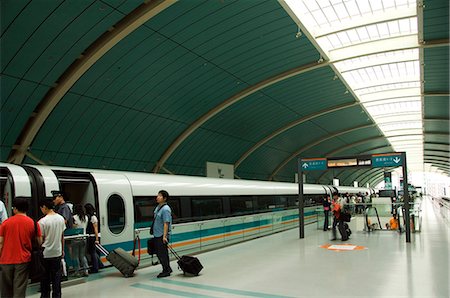 China,Shanghai. Maglev (magnetic levitation) Train between Shanghai city and Pudong International Airport which reaches a top speed of 430 kpm. Stock Photo - Rights-Managed, Code: 862-03351263