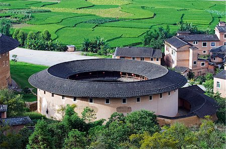 China,Fujian Province,Hakka Tulou round earth buildings,Unesco World Heritage site Stock Photo - Rights-Managed, Code: 862-03351761