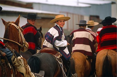 poncho - Chile,Region VI,Parral. Huasos taking part in a regional Rodeo competition. Stock Photo - Rights-Managed, Code: 862-03352228