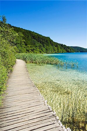 Walkway over Cyrstal Clear Waters of Lake Stock Photo - Rights-Managed, Code: 862-03352409