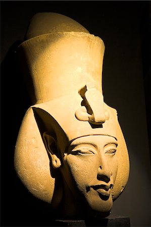 A bust of the 18th dynasty pharoah Akhenaten (also known as Amenhotep IV) in the National Museum in Alexandria,Egypt. Stock Photo - Rights-Managed, Code: 862-03352754