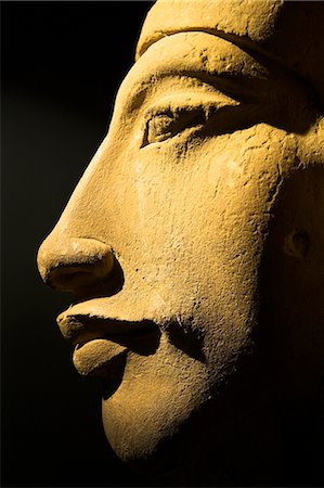 A bust of the 18th dynasty pharoah Akhenaten (also known as Amenhotep IV) in the National Museum in Alexandria,Egypt. Stock Photo - Rights-Managed, Code: 862-03352753