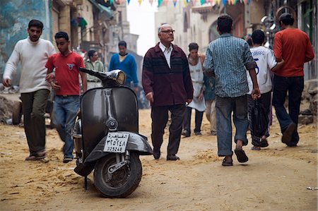 simsearch:846-02796313,k - A scooter is parked in a busy street in Islamic Cairo,Egypt Stock Photo - Rights-Managed, Code: 862-03352818