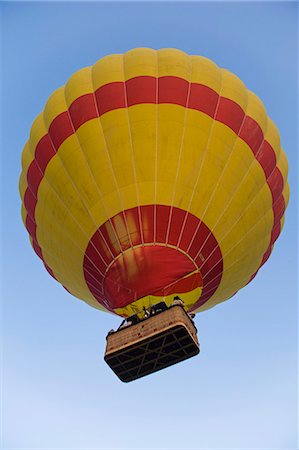 A balloon takes flight shortly after dawn on the West bank of the Nile,Egypt Stock Photo - Rights-Managed, Code: 862-03352901