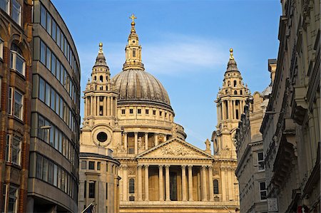 st paul's - St Paul's Cathedral from the West. Designed by Sir Christpher Wren,it was commissioned in 1668 to replace the one destroyed in the great fire of 1666. After going though several redesigns it was completed in 1708. It was struck by a bomb on October 9,1940,but survived. Stock Photo - Rights-Managed, Code: 862-03353107