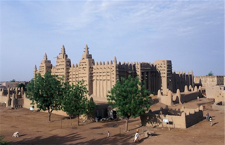 djenne - The Grand Mosque the largest mud building in Africa is a fine example of Islamic architecture. Built in neo-Sudanese style,it was renovated by the French in 1907. Designated a UNESCO World Heritage Site in 1988 Stock Photo - Rights-Managed, Code: 862-03364094