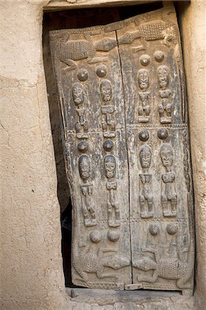 simsearch:400-05910051,k - Mali,Dogon Country. A finely carved old Dogon door of a traditional house at Sangha,an attractive Dogon village built among rocks on top of the Bandiagara escarpment. Stock Photo - Rights-Managed, Code: 862-03364187