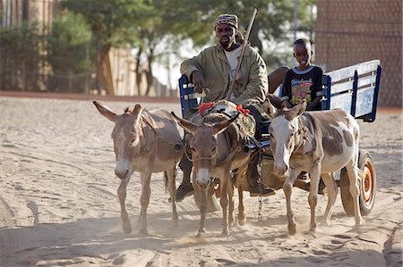 simsearch:862-03437232,k - Mali,Timbuktu. A donkey cart on the dusty streets of Timbuktu. Stock Photo - Rights-Managed, Code: 862-03364244