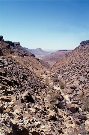 rocky terrain - Mountain road from Atar to Chinguetti showing the rugged landscape and rough terrain. Stock Photo - Rights-Managed, Code: 862-03364288