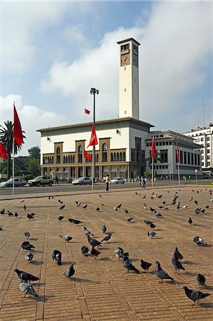 The Ancienne Prefecture (Old Police Station) on Place Mohammed V in Casablanca. Designed in 1930 in the Mauresque style,a blend of traditional Moroccan and Art Deco architecture and topped with a modernist clock tower. Stock Photo - Rights-Managed, Code: 862-03364652