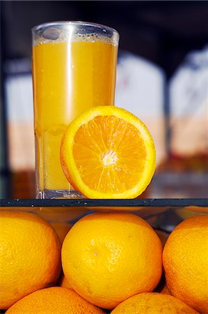 Orange juice for sale in the Djemaa el Fna. Stock Photo - Rights-Managed, Code: 862-03364731