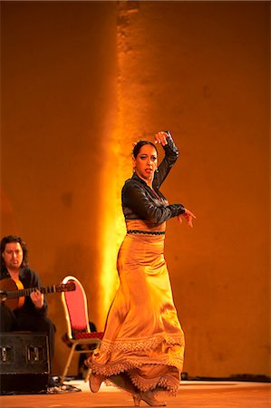 flamenco man and woman - Morocco,Fes. Maya performs Flamenco on the stage of the Bab Makina accompanied by Jose Luis Rodriguez. Stock Photo - Rights-Managed, Code: 862-03364823