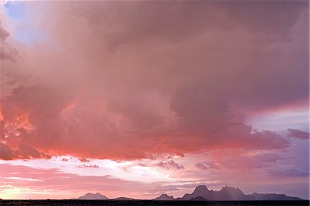 spitzkop - Namibia,Damaraland. Incredible light during stormy weather over Spitzkopje Mountain the 'Matterhorn of Africa' at sunset. Stock Photo - Rights-Managed, Code: 862-03365346