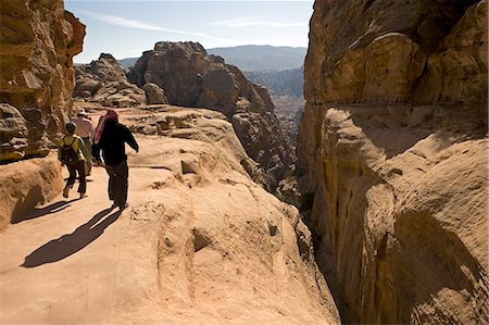 Jordan,Petra Region,Petra. A footpath from the Monastry descending through a natural ravine to the main city below. Stock Photo - Rights-Managed, Code: 862-03365906