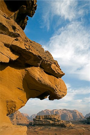 Jordan,Aqaba Region,Wadi Rum. One of the world's most spectacular desert landscapes,Wadi Rum has been a historical crossroads for Nabeatean traders heading from the Arabian Penisula,Lawrence of Arabia,and modern day adventure seekers. Stock Photo - Rights-Managed, Code: 862-03365933