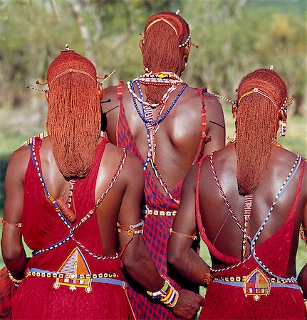 Africa,Kenya,Kajiado District,Ol doinyo Orok. Three Maasai warriors with long ochred hair wearing the traditional beaded belts of warriors. Stock Photo - Rights-Managed, Code: 862-03366852