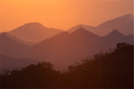 phu si laos - View of hills at sunset from the summit of Phu Si Stock Photo - Rights-Managed, Code: 862-03367064