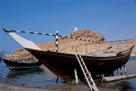 sur - Dhows under construction at the boat building yard in Sur. Stock Photo - Rights-Managed, Code: 862-03360196