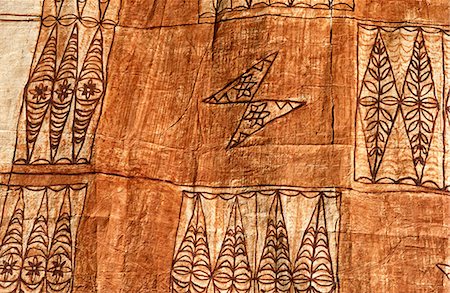 south pacific - Pacific Islands,Kingdom of Tonga. Detail of design and motifs on Tapa Cloth. Bark cloth,or tapa,has been produced throughout the islands of the South Pacific--in both Polynesia and Melanesia. The people of Tonga,Tahiti,Fiji,Samoa and other islands have made bark cloth in distinctive styles for both functional and ceremonial purposes. Foto de stock - Con derechos protegidos, Código: 862-03360379