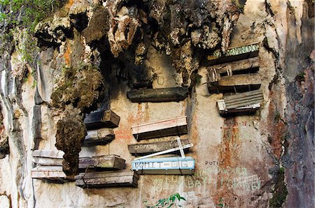 funerals - Philippines,Luzon Island,The Cordillera Mountains,Mountain Province,Sagada. World famous Hanging Coffins. Animistic Applai Elders entombed on limestone cliffs. Stock Photo - Rights-Managed, Code: 862-03360795