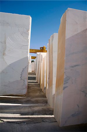 Portugal,Alentejo,Estremoz. Sheets of white marble stacked and ready to be transported to Lisbon from the marble town of Estremoz in the Alentejo region of Portugal. Stock Photo - Rights-Managed, Code: 862-03360967