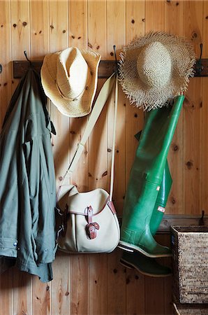simsearch:862-03361556,k - Hats,coats,waders and a fishing bag hang in the hall at GlenBatrick Lodge. The lodge overlooks the white sandy shore of Loch Tarbert on the west side of Jura. Beautifully isolated the lodge is only accessible by boat or a five hour walk. Stock Photo - Rights-Managed, Code: 862-03361534