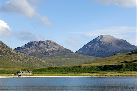 simsearch:862-03361556,k - GlenBatrick Lodge overlooks the white sandy shore of Loch Tarbert on the west side of Jura. Backed by the Paps of Jura and beautifully isolated,the lodge is only accessible by boat or a five hour walk. Stock Photo - Rights-Managed, Code: 862-03361539
