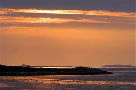 simsearch:862-03361556,k - Sunset on the calm water of Loch Tarbert on the west coast of Jura. Stock Photo - Rights-Managed, Code: 862-03361532