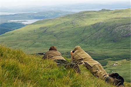 simsearch:862-03361556,k - As the riftle gets ready to take his shot a red deer stag,Benmore Estate stalker,Neilson Bissett,watches through binoculars. Stock Photo - Rights-Managed, Code: 862-03361555