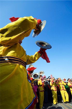 picture of the blue playing a instruments - China,Beijing. Changdain street fair - Chinese New Year Spring Festival - drumming performers. Stock Photo - Rights-Managed, Code: 862-03436979