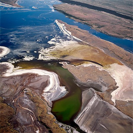 A section of the Uaso Nyiru delta from the air. This freshwater river flows through southern Kenya and enters the northern end of Tanzania's Lake Natron only to become alkaline in the intense heat of this closed basin Rift Valley lake. Stock Photo - Rights-Managed, Code: 862-03437181