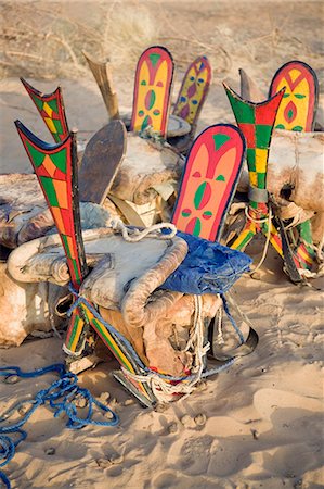 Mali,Timbuktu. A collection of colourful Tuareg camel saddles which are made of wood covered with leather. Stock Photo - Rights-Managed, Code: 862-03437233