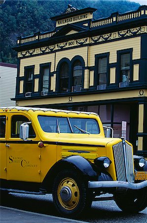 Old car (used for sightseeing tours) parked outside the Yukon Railroad Buildings in Skagway,Southeast Alaska,USA Stock Photo - Rights-Managed, Code: 862-03437424