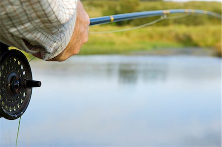 UK,Wales,Conwy. Trout fishing at a hill lake in North Wales Stock Photo - Rights-Managed, Code: 862-03437823