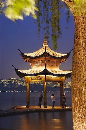 Pavilion on Xi Hu (West Lake) at dusk, Hangzhou, China Stock Photo - Rights-Managed, Code: 862-03710694