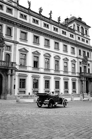 Czech Republic, Prague. A classic car drives tourists around the cobbled streets of Prague, near Prague Castle. Stock Photo - Rights-Managed, Code: 862-03710816