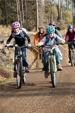 Family cycling along the Lakeside Way, Kielder Water & Forest Park, Northumberland, England. Stock Photo - Rights-Managed, Code: 862-03711001