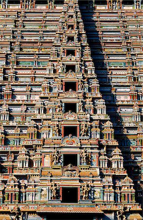 simsearch:862-03711843,k - Exuberant and colourful sculpture decorates the massive main gopura,or gateway,of the celebrated Ranganathaswamy Temple,in Srirangam,near Tiruchirapalli Stock Photo - Rights-Managed, Code: 862-03711887