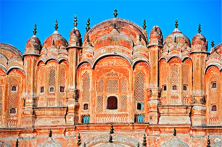 simsearch:862-03711843,k - Hawa Mahal; or the Palace of the Wind in the middle of Johari Bazaar and part of the zenana palace (women's quarters) designed by Lalchand Usta in 1799. Jaipur; Rajasthan; India. Stock Photo - Rights-Managed, Code: 862-03711967