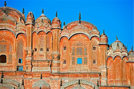 simsearch:862-03711843,k - Hawa Mahal; or Palace of the Wind in the middle of Johari Bazaar and part of the zenana palace (women's quarters) designed by Lalchand Usta in 1799. Jaipur; Rajasthan; India. Stock Photo - Rights-Managed, Code: 862-03711968