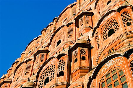 simsearch:862-03711843,k - Hawa Mahal; or Palace of the Wind in the middle of Johari Bazaar and part of the zenana palace (women's quarters) designed by Lalchand Usta in 1799. Jaipur; Rajasthan; India. Stock Photo - Rights-Managed, Code: 862-03711972